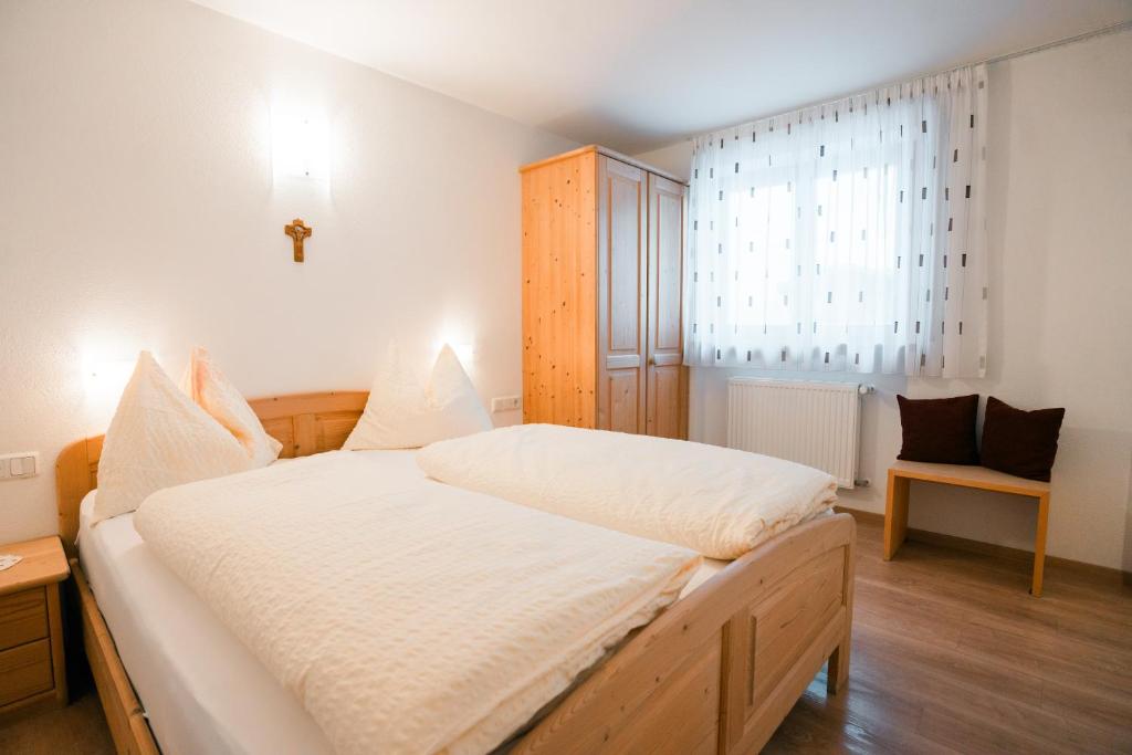 Postel nebo postele na pokoji v ubytování Untertelshof
