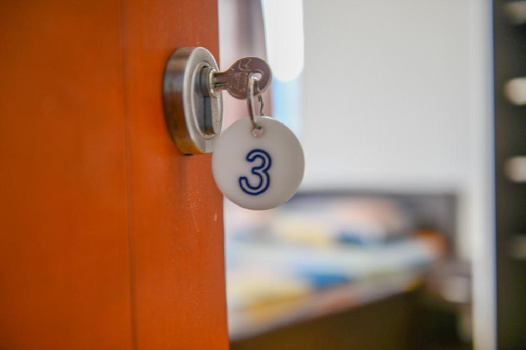 Postel nebo postele na pokoji v ubytování Rexha Apartments