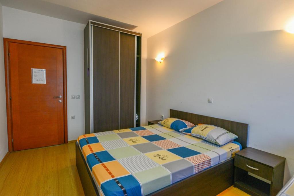 Postel nebo postele na pokoji v ubytování Rexha Apartments