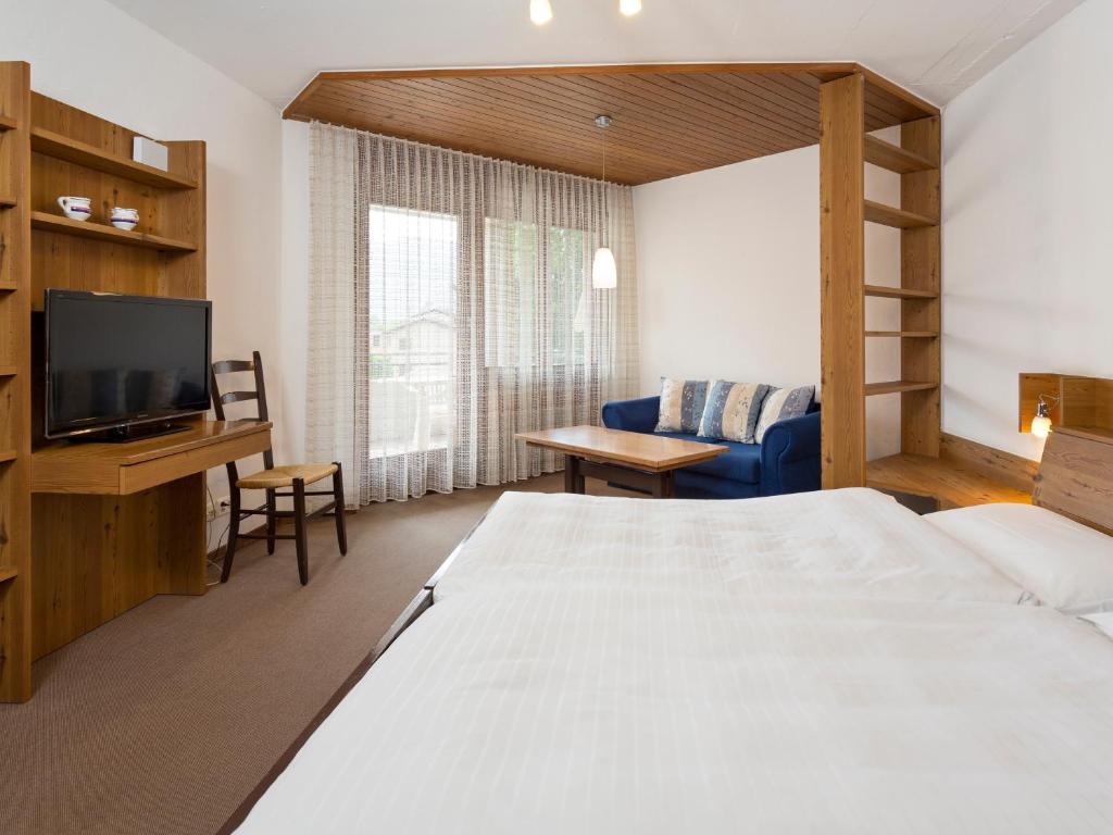 Postel nebo postele na pokoji v ubytování Resort Al Centro