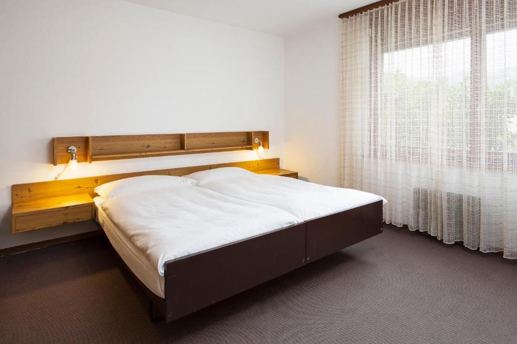 Postel nebo postele na pokoji v ubytování Resort Al Centro