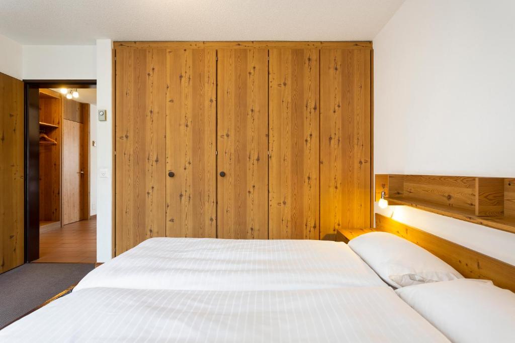 Postel nebo postele na pokoji v ubytování Resort Al Centro