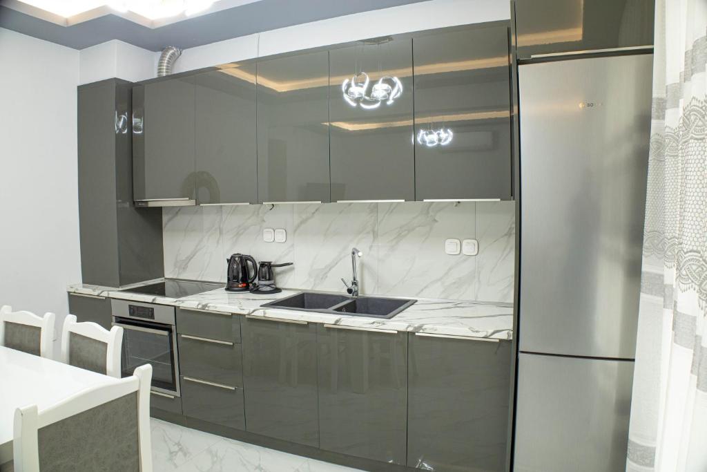 Kuchyň nebo kuchyňský kout v ubytování Mourati House