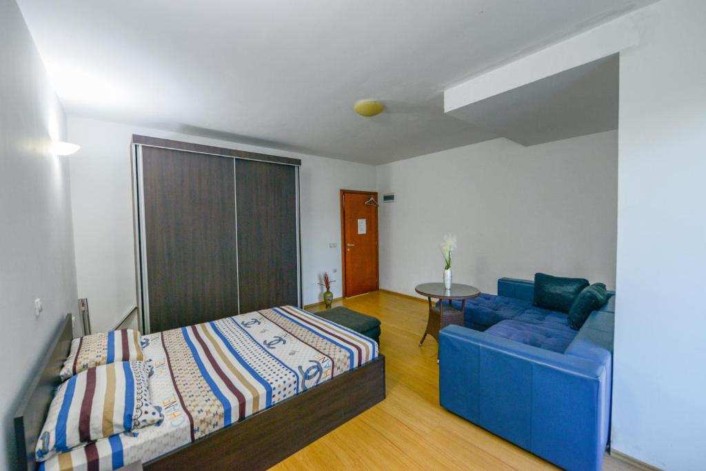 Postel nebo postele na pokoji v ubytování Rexha Apartments