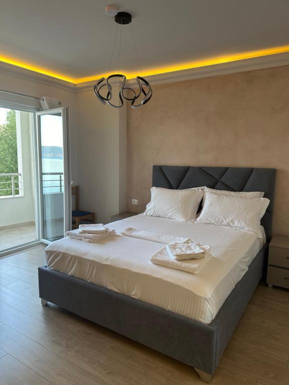 Postel nebo postele na pokoji v ubytování Hotel DEMOLI