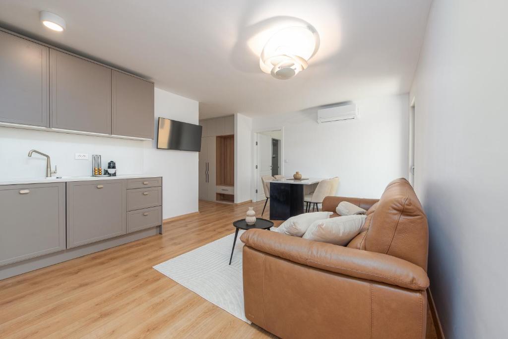 Kuchyň nebo kuchyňský kout v ubytování Rooms & Apartments Niko