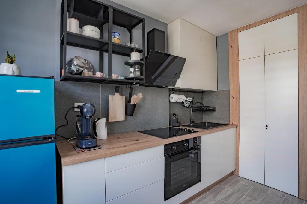 Kuchyň nebo kuchyňský kout v ubytování Apartman Sanda