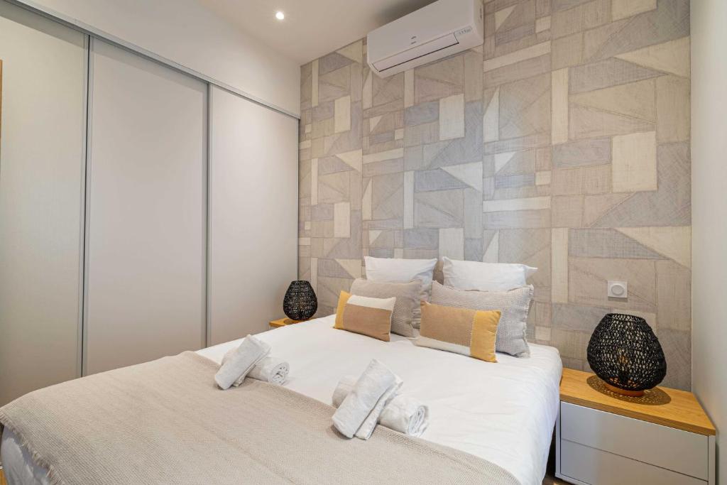 Posteľ alebo postele v izbe v ubytovaní Beautiful renovated residence near Croisette