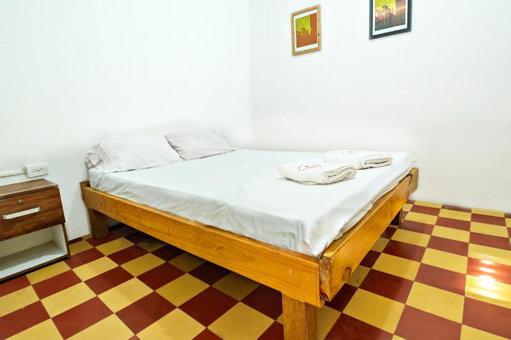 Postel nebo postele na pokoji v ubytování JEP Hostel