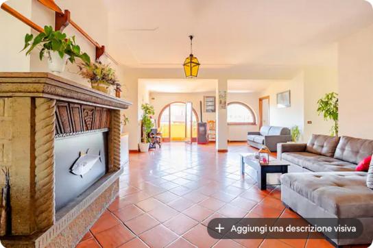 a living room with a couch and a fireplace at I like Chopin apartments in Fiumicino