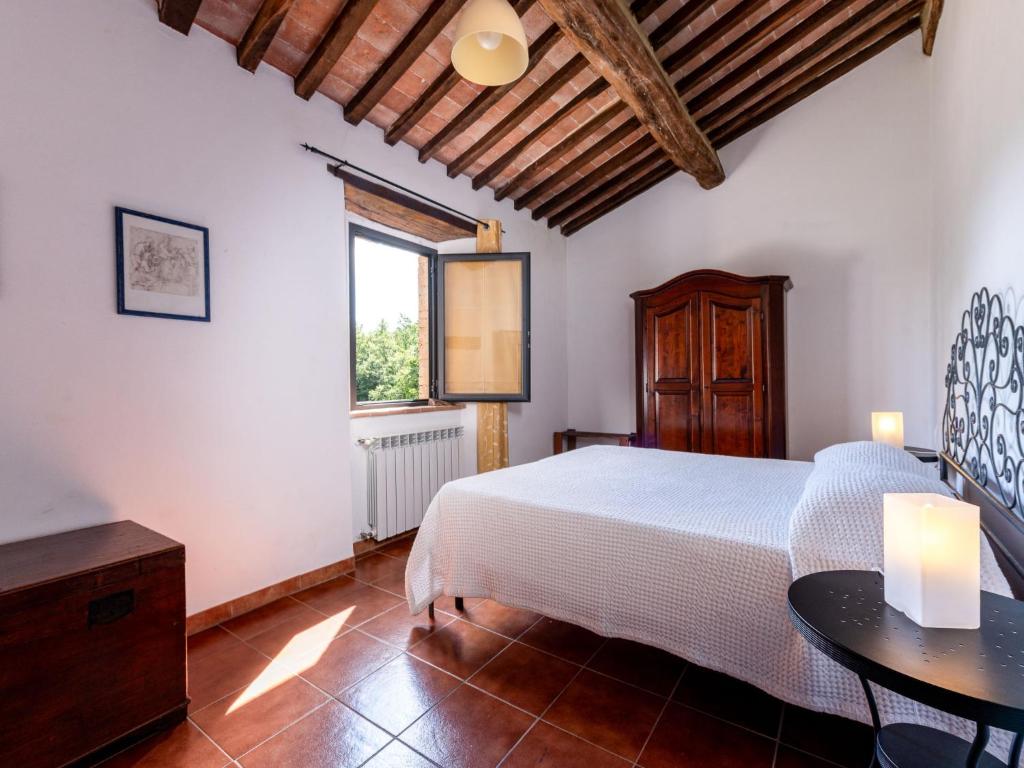 A bed or beds in a room at Holiday Home Il Forno by Interhome