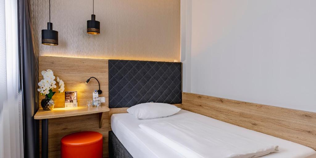 PLAZA INN Rieker Stuttgart Hauptbahnhof - Resim 42