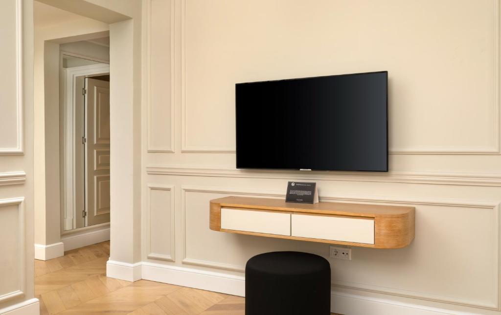 TV a/nebo společenská místnost v ubytování Vucino Suites