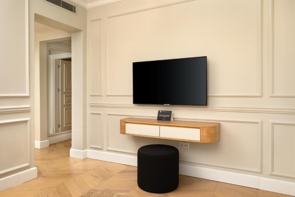TV a/nebo společenská místnost v ubytování Vucino Suites