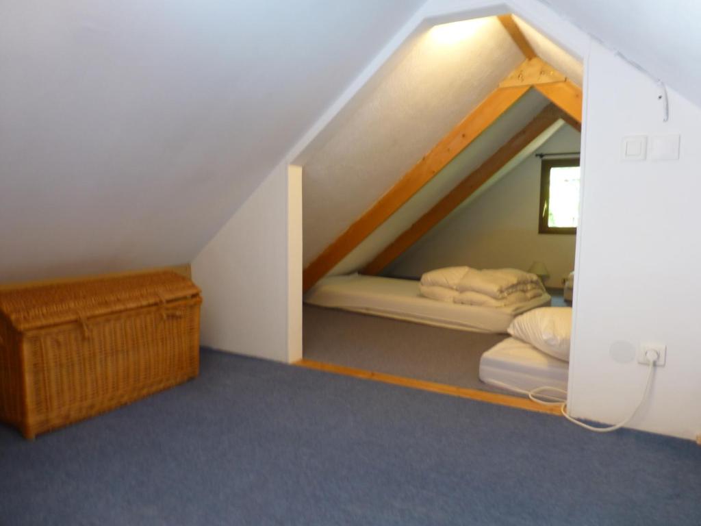 Postel nebo postele na pokoji v ubytování Gîte du Colombier