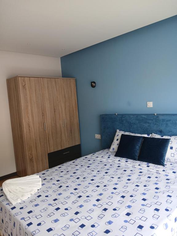 Postel nebo postele na pokoji v ubytování Casa Cantinho d`ouro