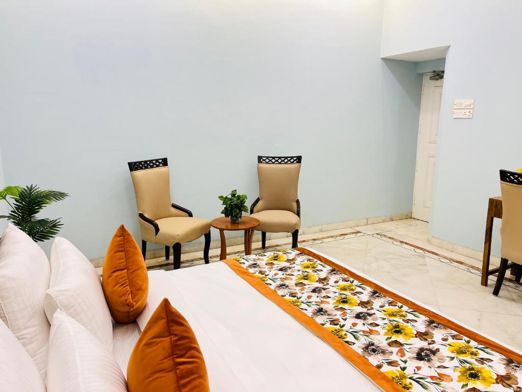 Posezení v ubytování Gulmohar Residency, Hauz Khas New Delhi, Couple Friendly