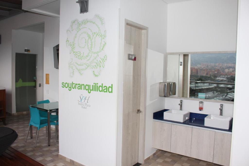 Kuchyň nebo kuchyňský kout v ubytování Hotel Sixtina Plaza Medellin
