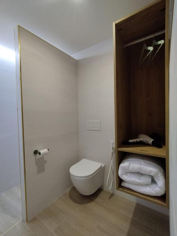 Koupelna v ubytování Plaza Rooms