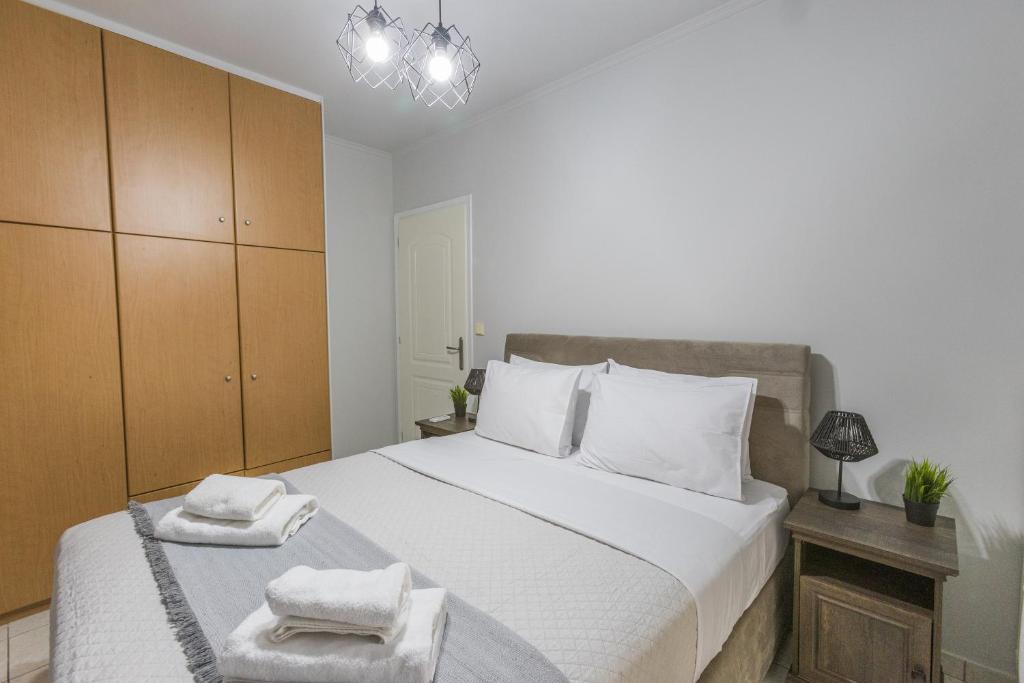 Postel nebo postele na pokoji v ubytování Raise Piraeus Harbor Flats