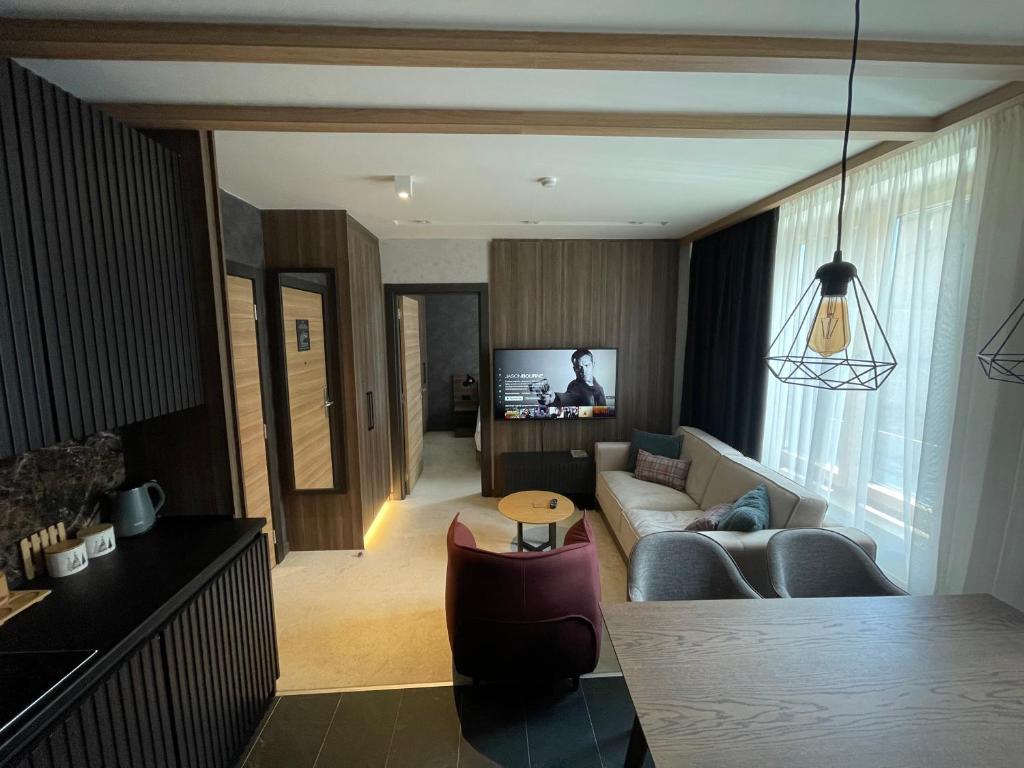 Posezení v ubytování Woodside Apartment