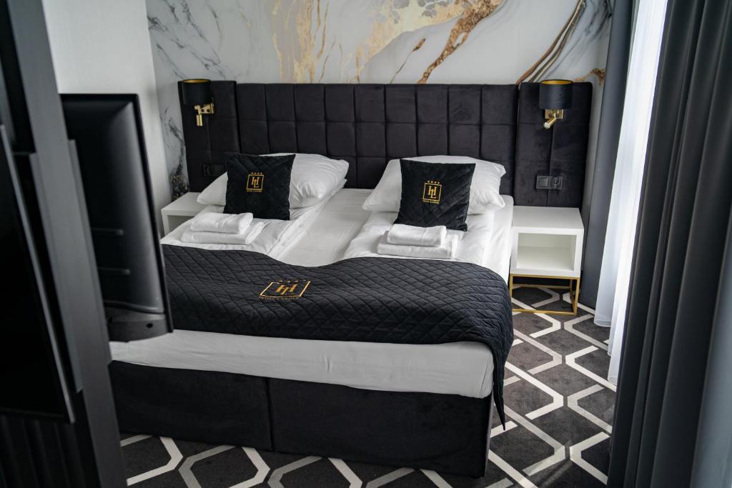 Posteľ alebo postele v izbe v ubytovaní Hotel Lantier Wellness & Spa
