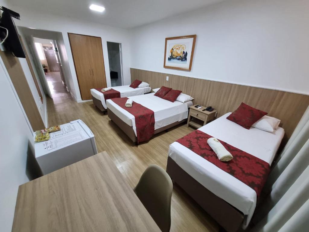 Postel nebo postele na pokoji v ubytování Max Hotel