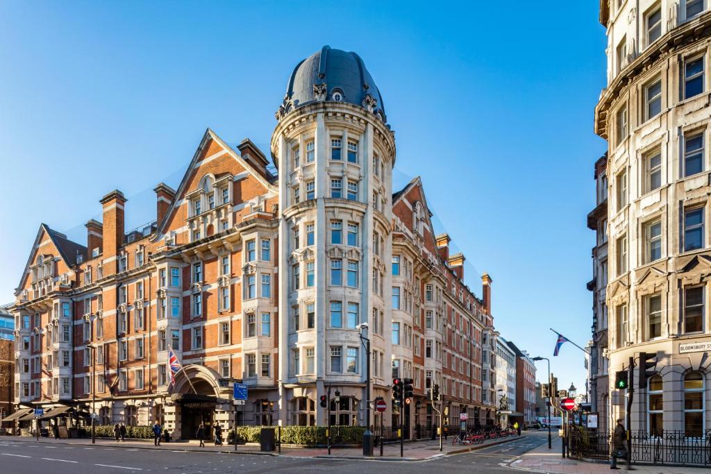 a tall building with a dome on top of it at Radisson Blu Hotel, London Bloomsbury in London