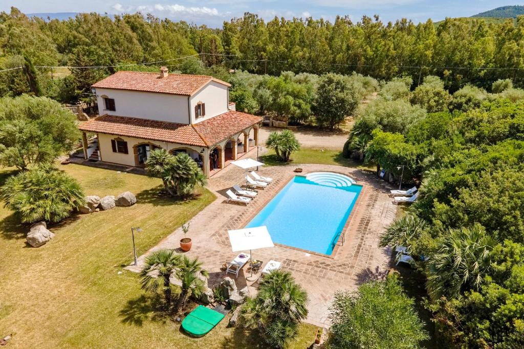an aerial view of a villa with a swimming pool at Agri Resort San Giuliano in Santa Maria la Palma