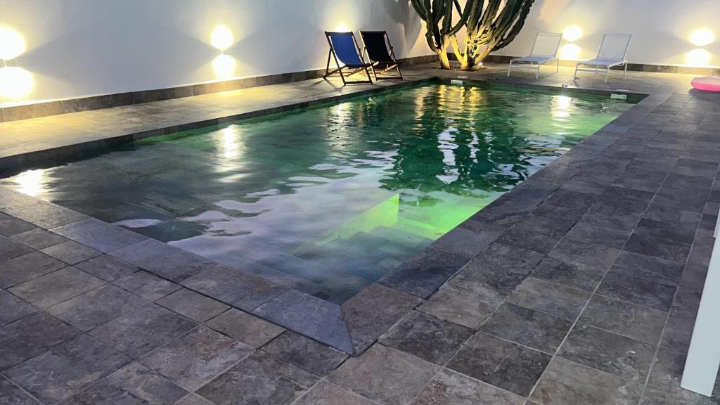 Bazén v ubytování APARTAMENTOS RURALES (LA COBIJÁ) APART. Nº3 CONIL nebo v jeho okolí