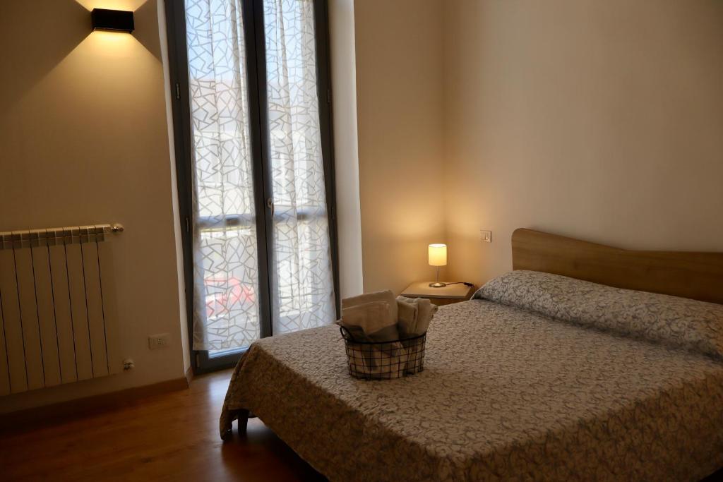 Postel nebo postele na pokoji v ubytování A due passi dal centro, Valentino's Apartment