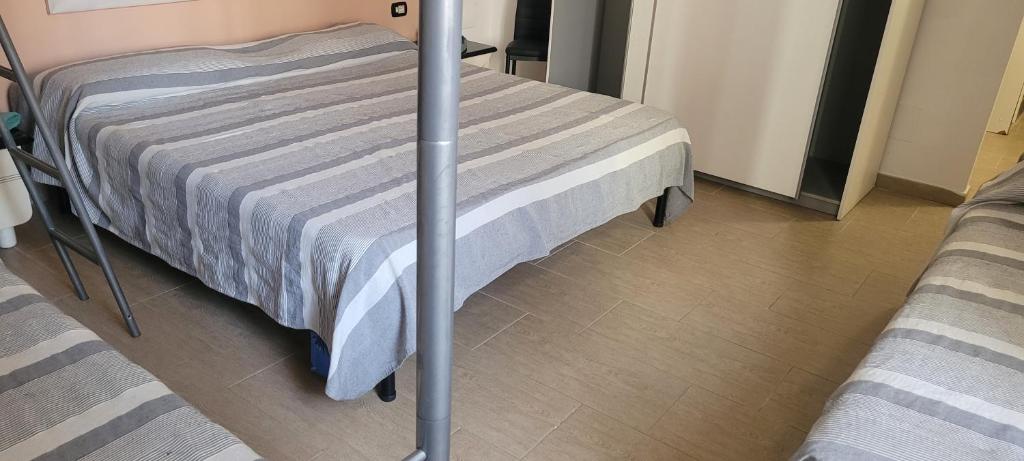 Postel nebo postele na pokoji v ubytování Alghero sun