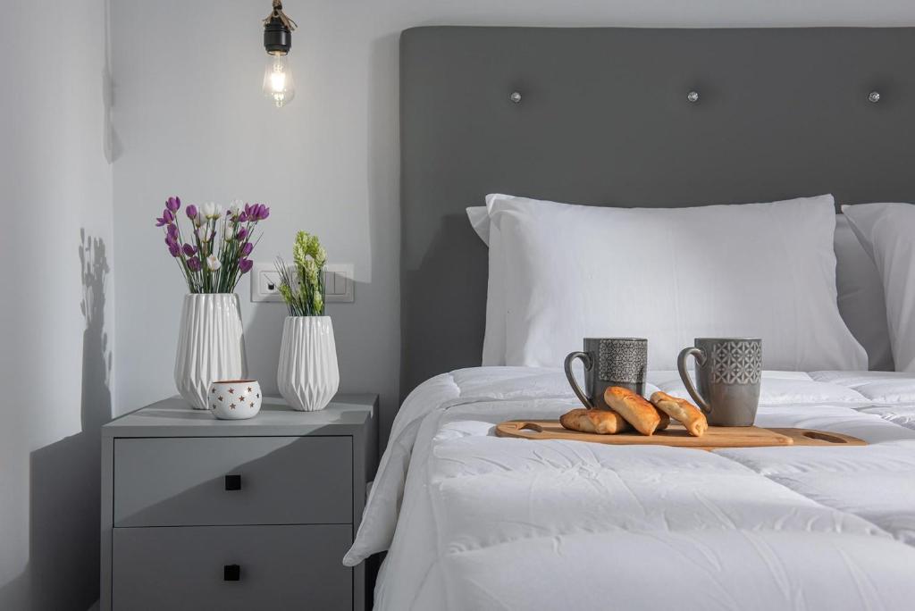 A bed or beds in a room at Iris Villa 1 - Archanes Crete