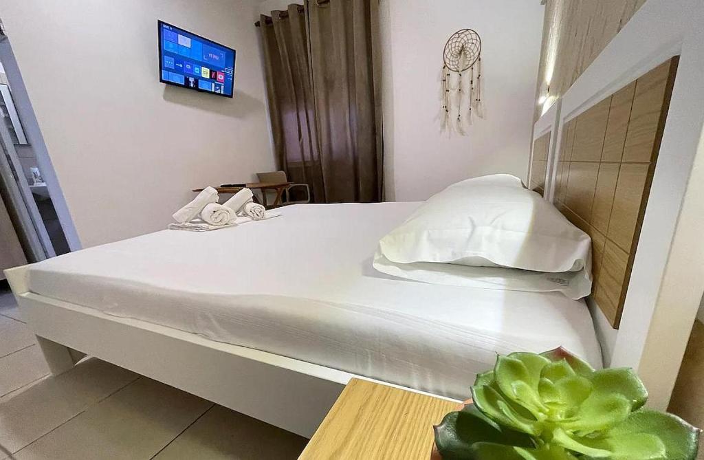 Postel nebo postele na pokoji v ubytování Harmony Central