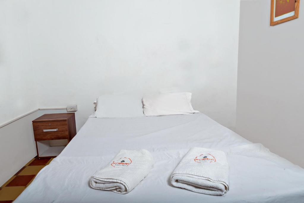 Postel nebo postele na pokoji v ubytování JEP Hostel