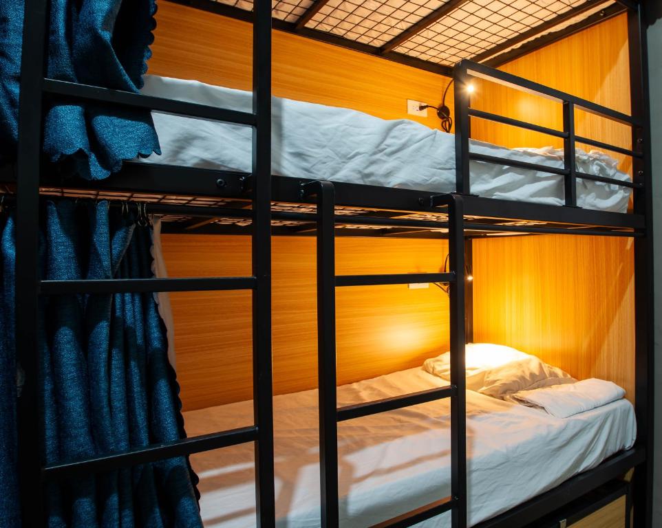 Postel nebo postele na pokoji v ubytování JEP Hostel