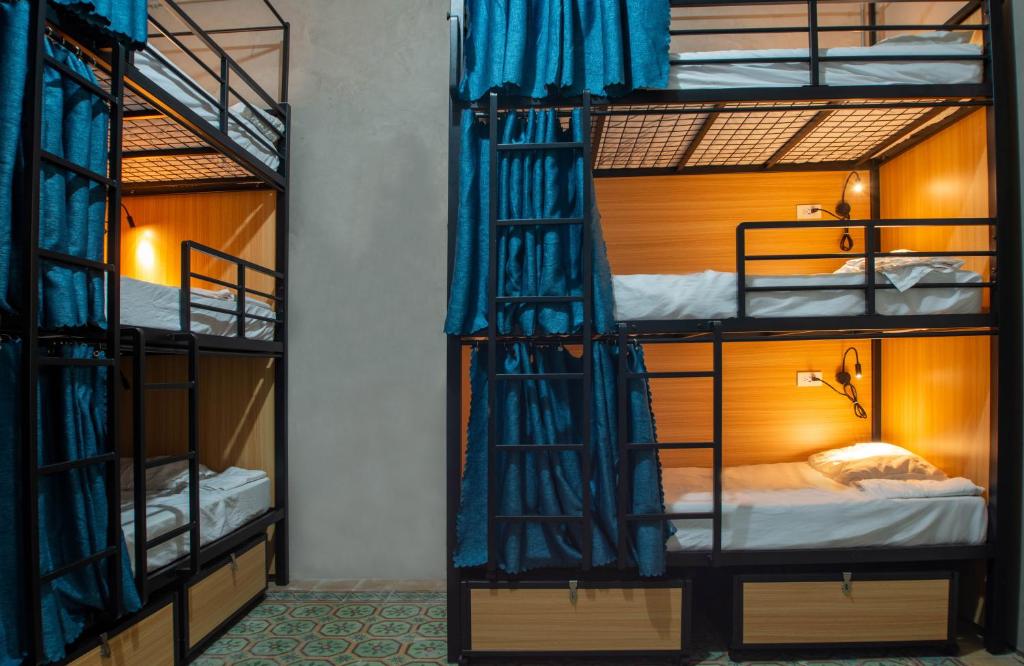 Postel nebo postele na pokoji v ubytování JEP Hostel