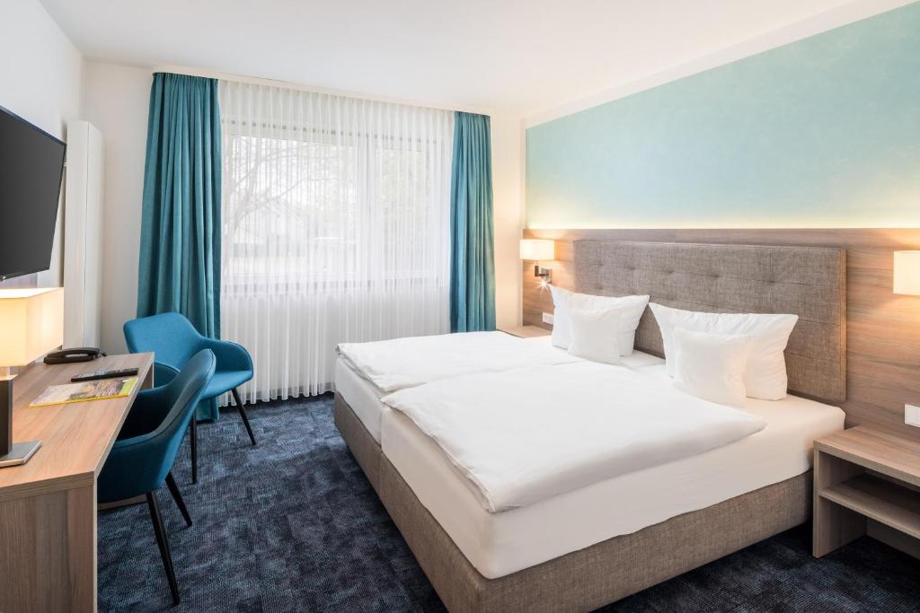 Postel nebo postele na pokoji v ubytování Hotel Celler Tor