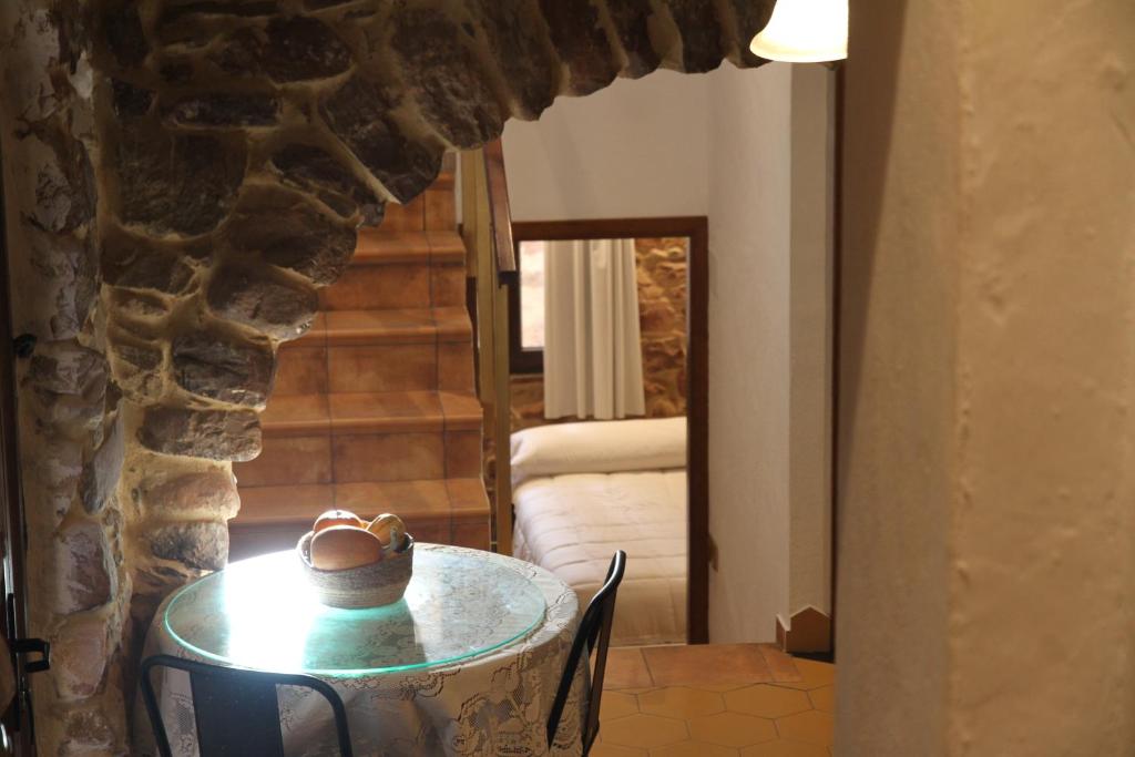 Posedenie v ubytovaní Casa rural rústica "EL COLMENAR" para parejas, familias o amigos a la montaña