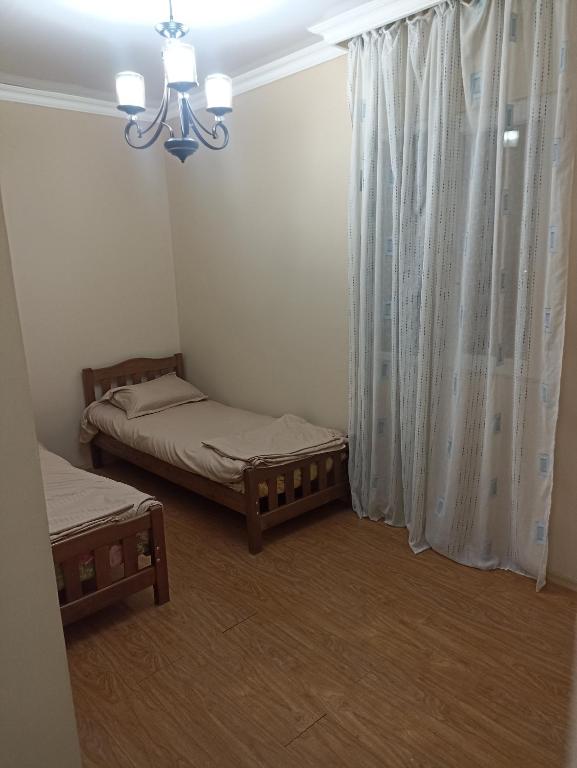 Postel nebo postele na pokoji v ubytování guest house come