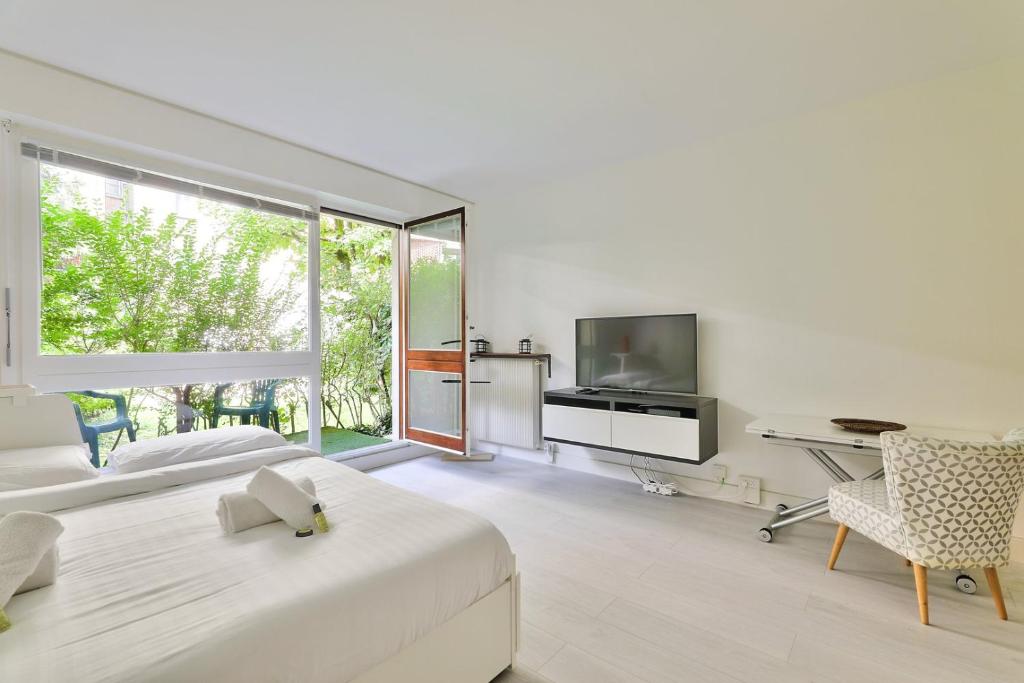 Photo de la galerie de l'établissement GuestReady - Studio au calme avec rez de jardin, à Boulogne-Billancourt