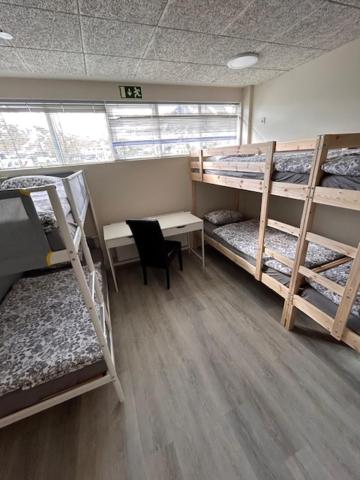 Postel nebo postele na pokoji v ubytování Hótel Dalvík