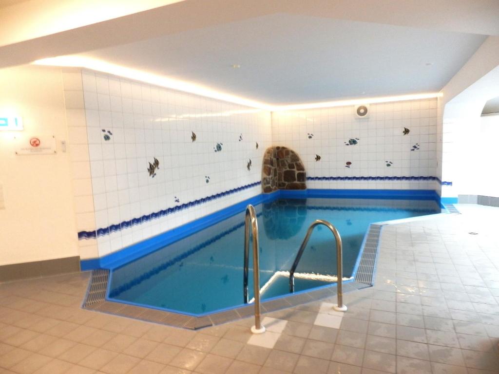 Bazén v ubytování Fewo mit Schwimmbad nebo v jeho okolí