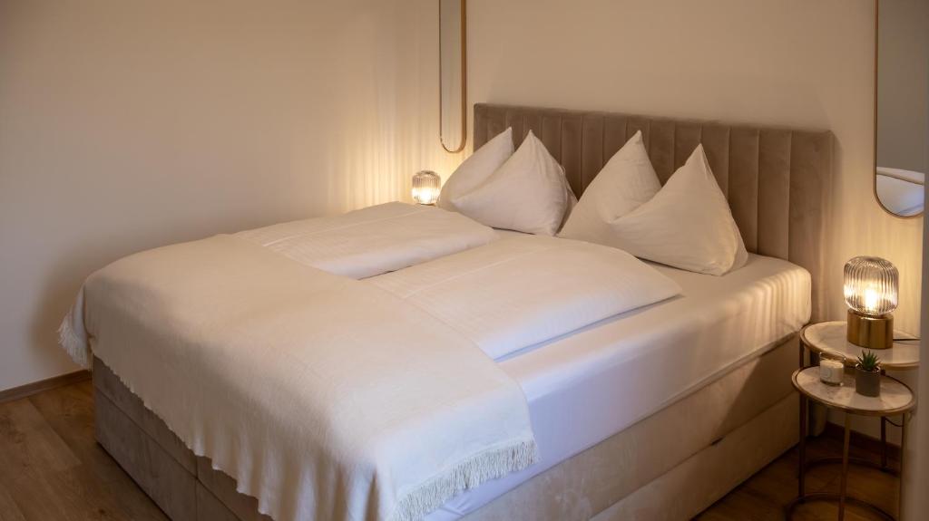 Postel nebo postele na pokoji v ubytování Flat Bull Appartement mit Garten