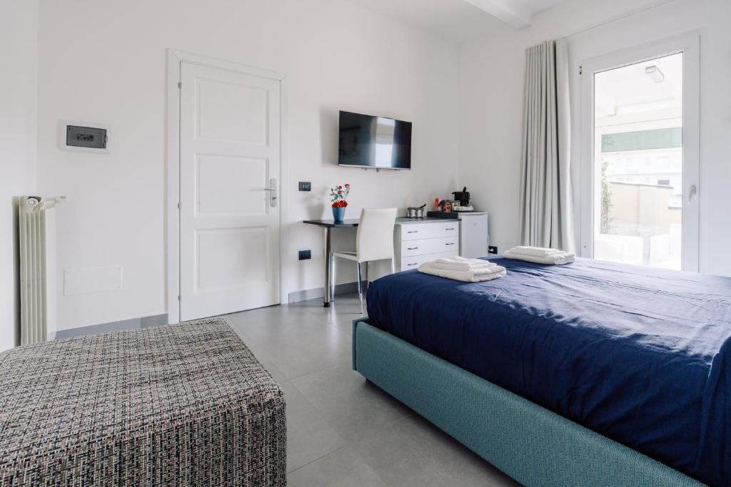 Postel nebo postele na pokoji v ubytování B&B Insonnyroom