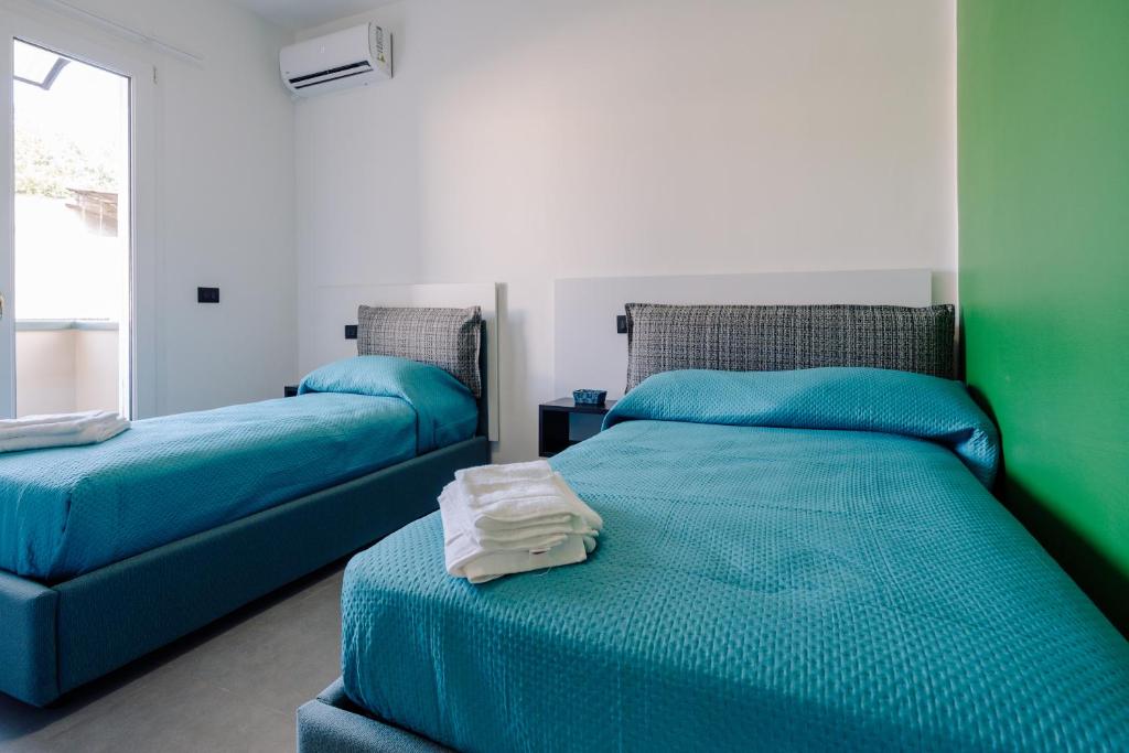 Postel nebo postele na pokoji v ubytování B&B Insonnyroom