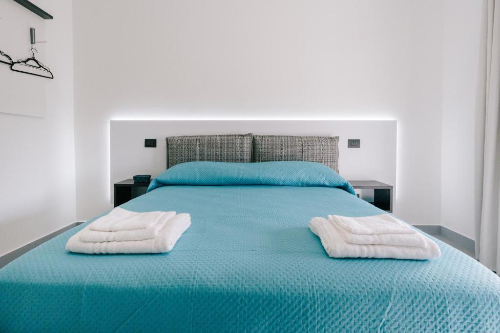 Postel nebo postele na pokoji v ubytování B&B Insonnyroom