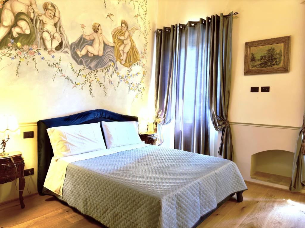 Łóżko lub łóżka w pokoju w obiekcie Relais Santa Margherita
