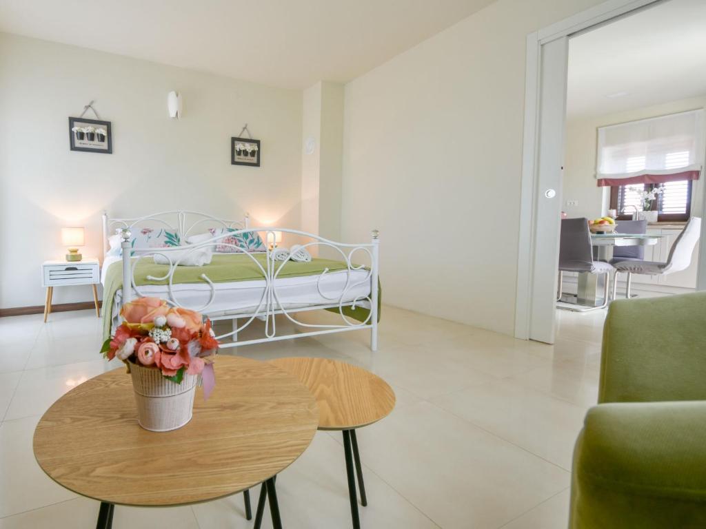 Posteľ alebo postele v izbe v ubytovaní Holiday Home Korina by Interhome