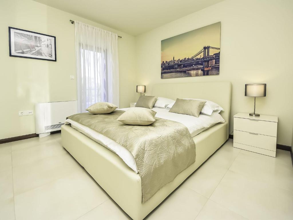 Posteľ alebo postele v izbe v ubytovaní Holiday Home Korina by Interhome